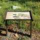 Whiskeytown NRA close up of interpretive panel in cantilever pedestal