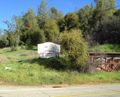 Whiskeytown NRA road side interpretive panels and old blacksmith shop