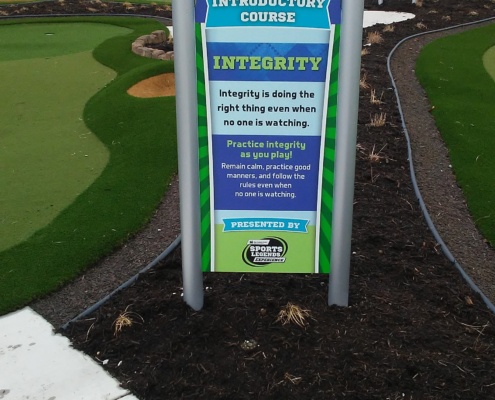 Indianapolis Children's Museum Large bright graphic panel signs in outdoor play area