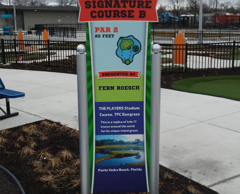 Indianapolis Children's Museum Large bright graphic panel signs in outdoor play area
