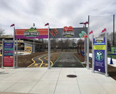 Indianapolis Children's Museum Large bright graphic panel signs in outdoor play area