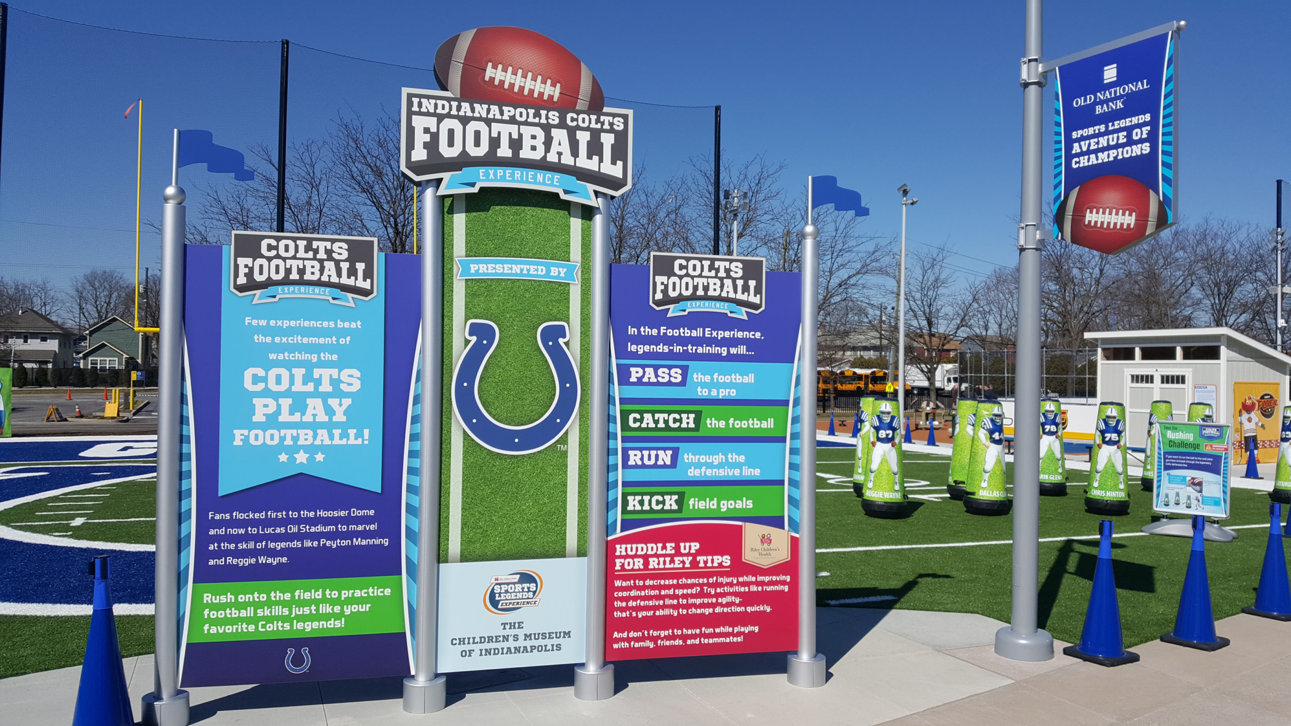 Indianapolis Childrens Museum Large bright graphic panel signs in outdoor play area