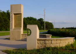 Trail Stories Large concrete structures with interpretive panels attached