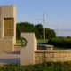 Trail Stories Large concrete structures with interpretive panels attached