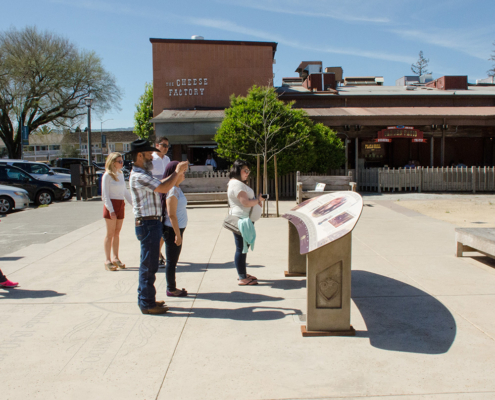 Weather Resistant Information Signage with People taking photos